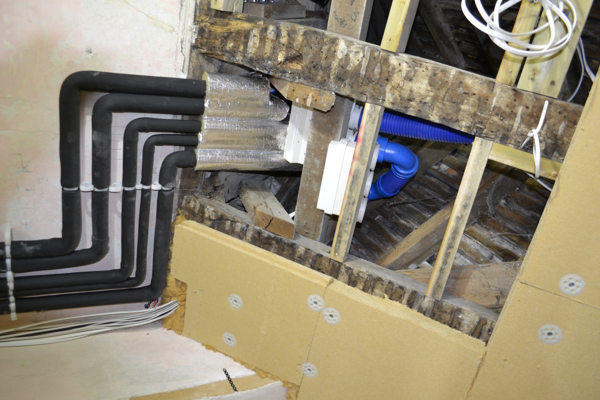 Mechanical ventilation and heat recovery system components in the Warmcel insulated roof space. (Matthew Slocombe)