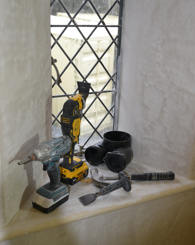 Newly plastered and insulated window reveal