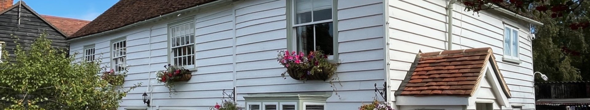 7 and 9 South Street - Timberclad cottages in sunshine