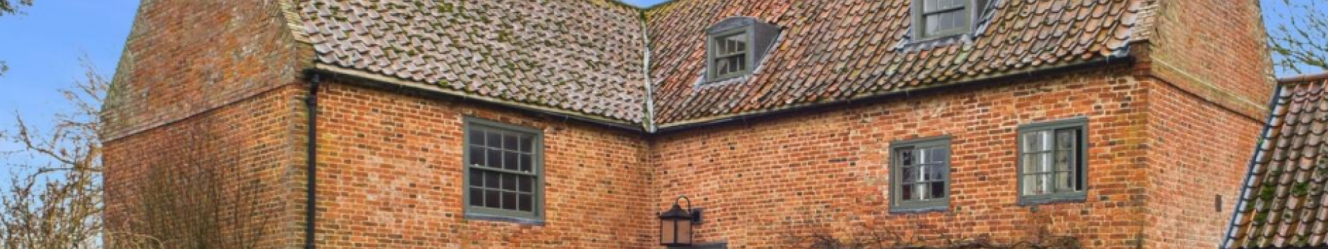 very attractive former farmhouse