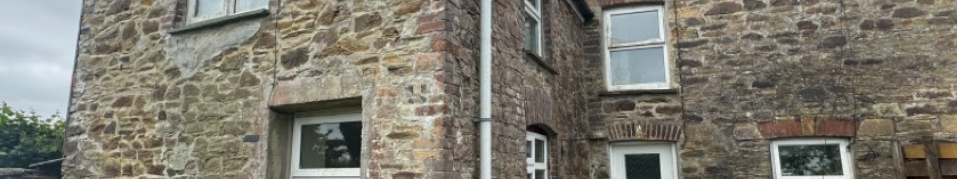 end of terrace stone built cottage