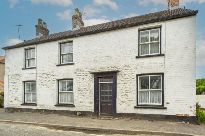 Former farmhouse for sale