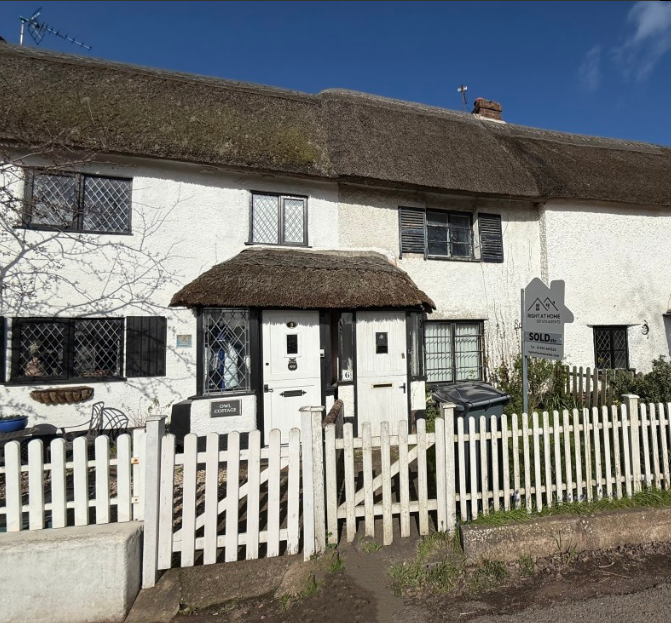 Terraced thatched cottage