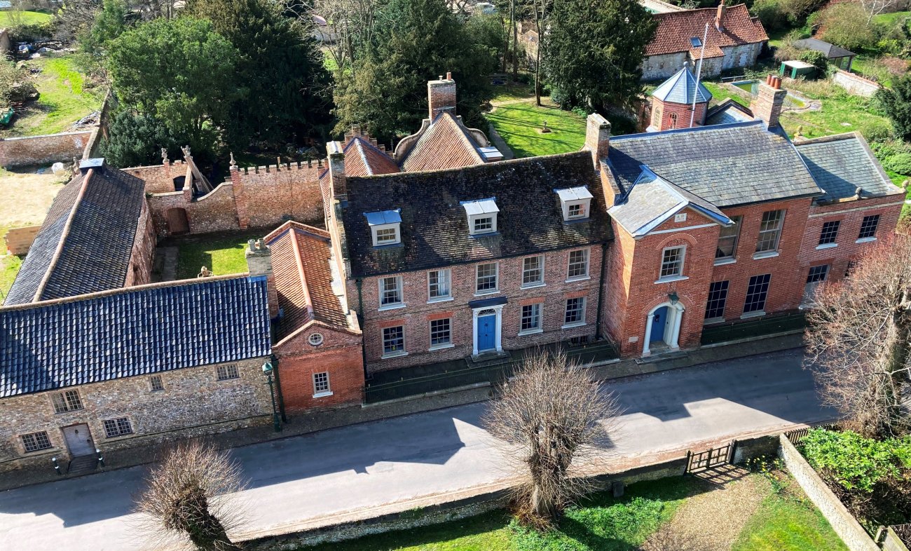 Northwold Manor from the air. © Warwick Rodwell