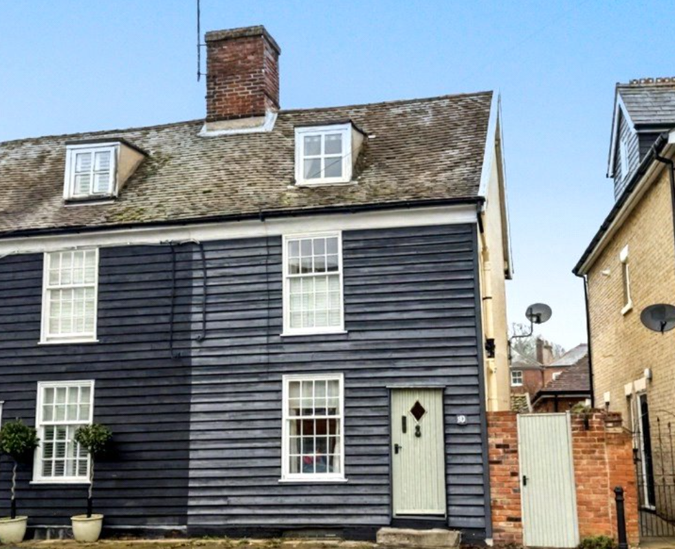 weather boarded semi detached cottage