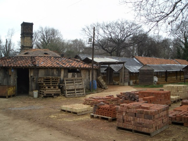 Bulmer Brick and Tile Works with 1930s coal-fired kiln on left, drying sheds to right and end product stacked in the foreground