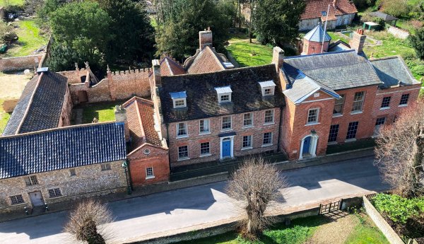 Northwold Manor from the air. © Warwick Rodwell